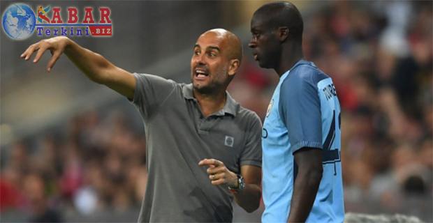 Yaya Toure Senang Tetap Bertahan Di Man City